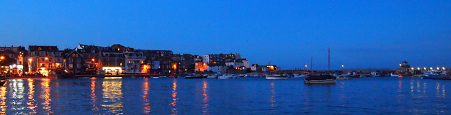 St Ives harbour lights on water 