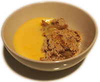 bowl of apple crumble and custard